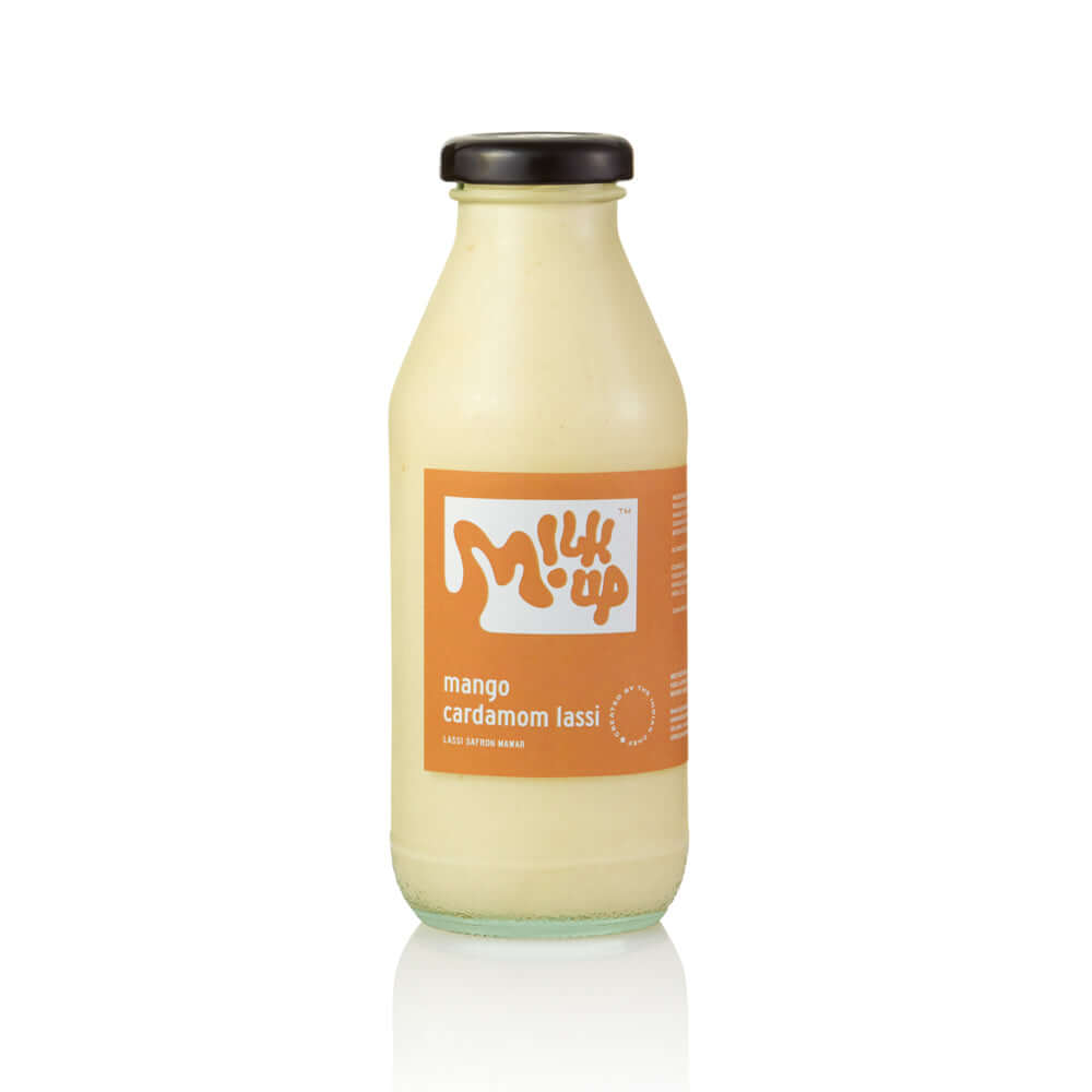 Mango Cardamom Lassi 350ml, glass in Bali. Milkup dairy products