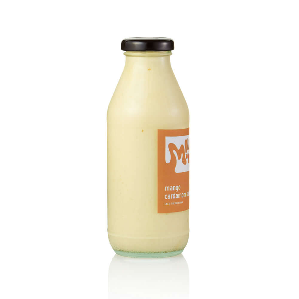 Mango Cardamom Lassi 350ml, glass in Bali. Milkup dairy products